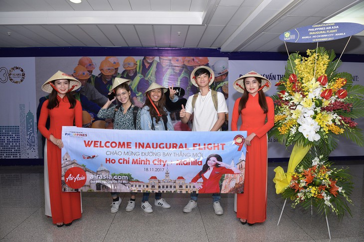 AirAsia mở chuyến bay thẳng đầu tiên từ TP.HCM đến Manila - Ảnh 1.